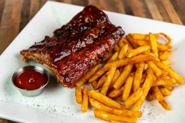 Costillas BBQ<br><FONT COLOR="#00aaa0">$22.99</FONT>